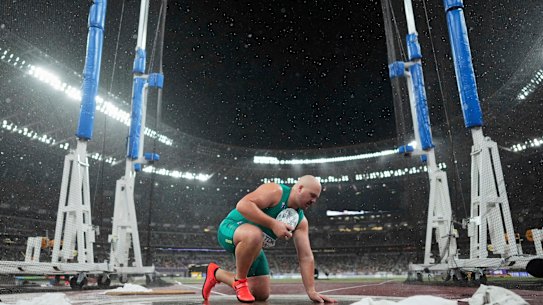 Matthew Denny slipped in the poor conditions for the discus final.
