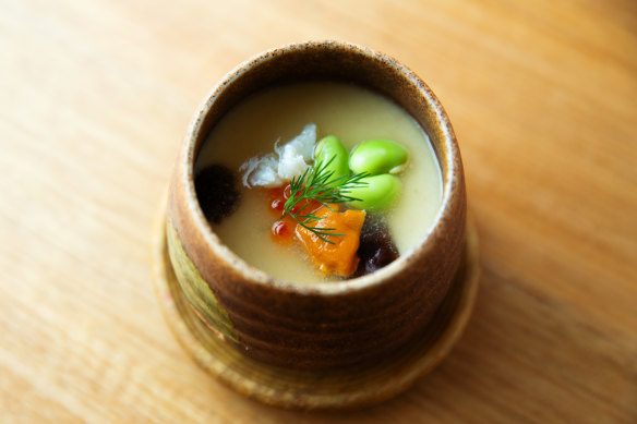 Blue swimmer chawanmushi is a  a delicate, quivering steamed egg custard with crabmeat buried beneath its surface.
