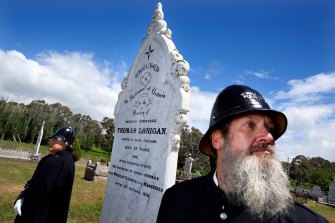 Members of the Victoria Police Historical Society at the dedication service in Mansfield to mark the restoration of the graves of the three officers slain by the Kelly Gang.