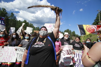 Native American protesters demonstrate in Keystone, South Dakota on Friday, ahead of President Donald Trump's visit to the memorial.
