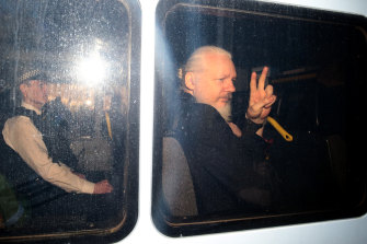 Assange in a police vehicle following his arrest at London’s Ecuadorian embassy in April. 