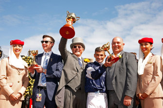 Joseph Oâ€™Brien (left), pictured with Lloyd Williams and Corey Brown after Rekindlingâ€™s 2017 Melbourne Cup win.