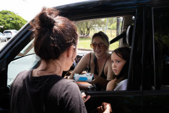 A mother and daughter drive around Wardell offering sushi and brownies to residents.