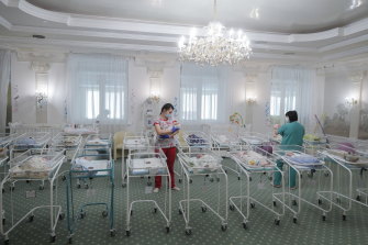Nurses care for newborn babies at a hotel in Kyiv, Ukraine. During the pandemic, many babies could not be picked up due to border closures. 