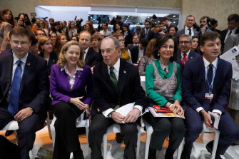 Angus Taylor, Australia's Energy and Emissions Reduction Minister (right), sits with other delegations during a panel session earlier this week on financing the Paris climate agreement. 