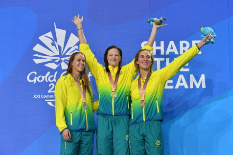 Golden girls: 50m butterfly medallists Holly Barratt (silver), Cate Campbell (gold) and  Madeline Groves (bronze).