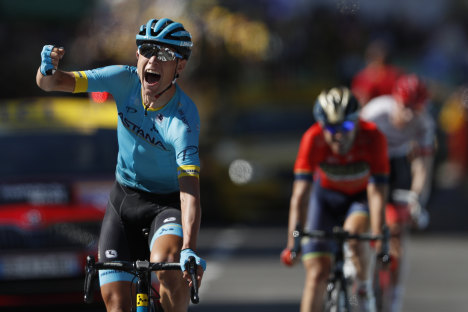 Astana's Magnus Cort Nielsen crosses the finish line to win stage 15 of the Tour de France in Carcassonne on Sunday.