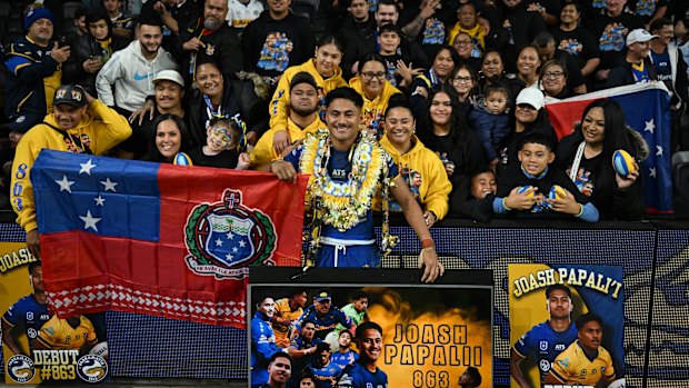Joash Papalii with his family and friends after helping the Eels to victory on Friday night.