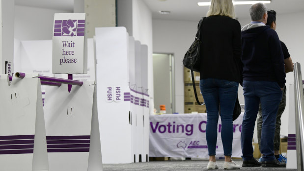 People casting their ballots at a Sydney voting centre on the first day of pre-poll at the 2019 federal election. 