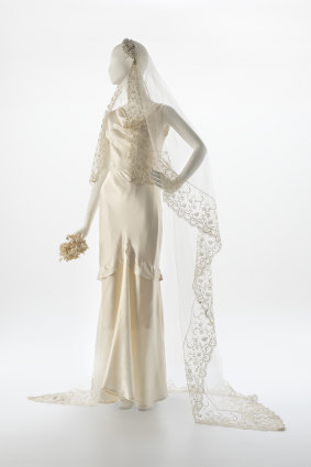 A 1930s silk bridal gown, bias cut with a donated veil.