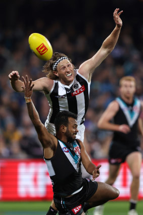 Willie Rioli and Nathan Murphy contest the ball during Saturday night’s game.