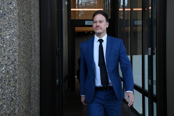 ABC Investigations journalist Josh Robertson leaves the Federal Court in Sydney on Wednesday.