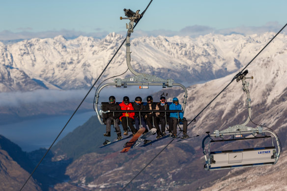Skiers ride on the Coronet Express Chairlift at Coronet Peak, in Queenstown, New Zealand, last week.