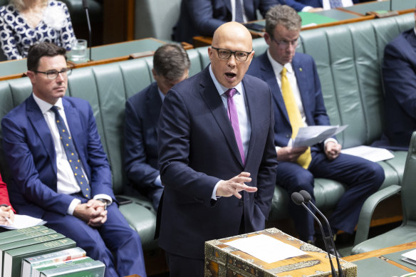 Opposition Leader Peter Dutton and male colleagues during question time at Parliament House.