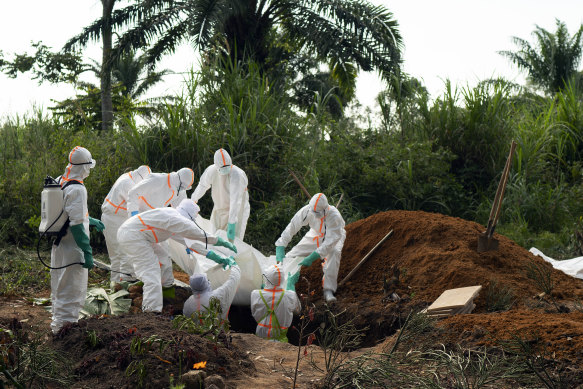 An Ebola victim is put to rest at the Muslim cemetery in Beni, Congo, last year.