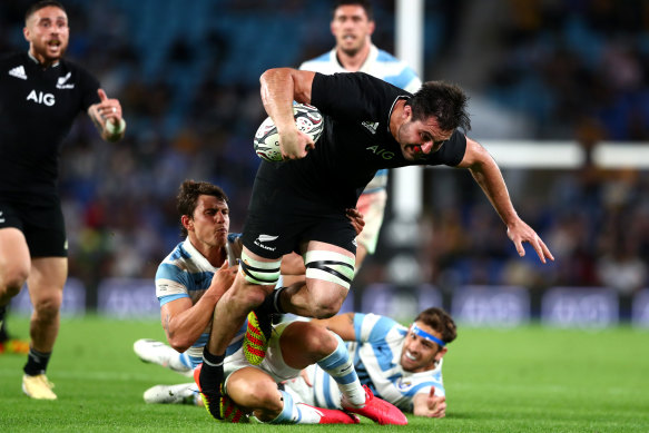 A rampaging Luke Jacobson storms forward for the All Blacks during their 39-point shutout of Argentina.
