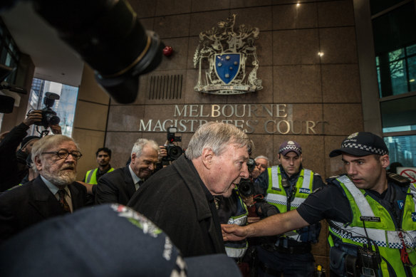 George Pell arrives at Melbourne Magistrates’ Court in 2017 to face historic sexual assault charges. After a first jury could not reach a verdict, a second convicted him. He was acquitted on appeal in 2020.