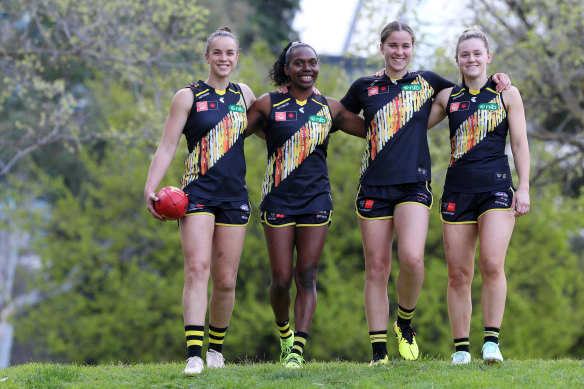 Richmond AFLW players donning their First Nations jumper for this season.