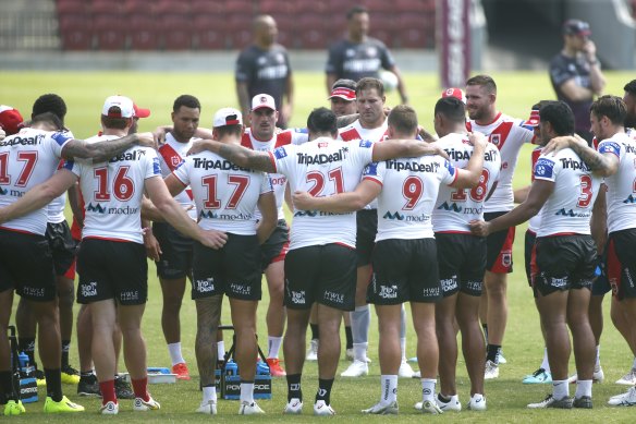 Dragons players huddle during a pre-season hit-out against Manly on Saturday morning.
