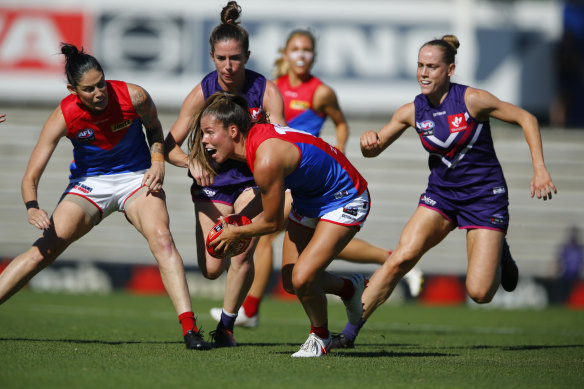 Melbourne’s Kate Hore, centre, in action during round eight. 