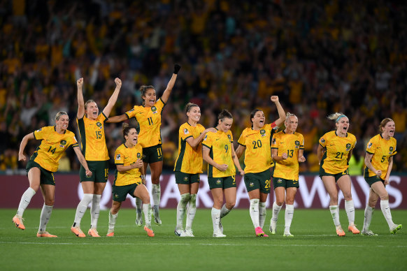 The Matildas celebrate a made penalty.