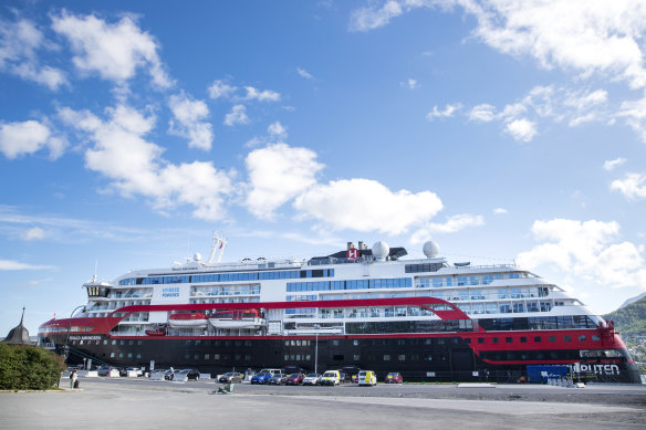Hurtigruten's MS Roald Amundsen, docked in Tromso, Norway on Sunday. Authorities are trying to trace passengers who have already left the ship.