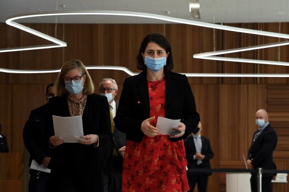 NSW Premier Gladys Berejiklian (centre) and Chief Health Officer Dr Kerry Chant (left) on Monday.
