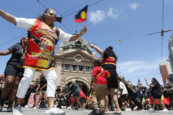 Invasion Day protesters outside Flinders Street Station on Thursday.