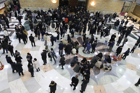 South Korean lawmakers gather at the National Assembly building.