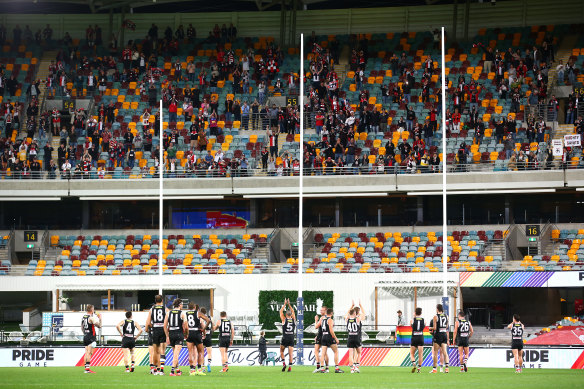 The Saints thanks fans at the Gabba after their win over the Swans.