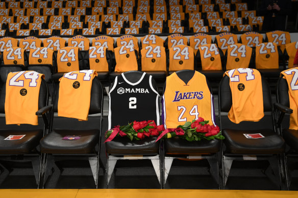The Lakers honour Kobe Bryant and his daughter Gigi by covering the courtside seats they occupied with flowers, Gigi's Mamba jersey and Kobe's jersey before the game against the Portland Trail Blazers at Staples Center in Los Angeles.
