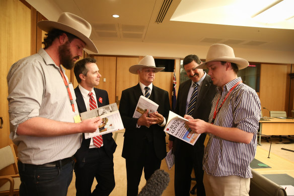 Betoota editors Clancy Overell (left) and Errol Parker (right) met with now-minister Jason Clare, independent MP Bob Katter and former Labor MP Mike Kelly in 2016.