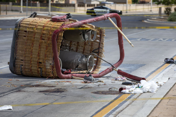 The basket of a hot air balloon which crashed lies on the pavement in Albuquerque, New Mexico. 