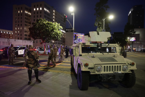 National Guardsmen stand watch as protests over the death of George Floyd continued in Los Angeles. 