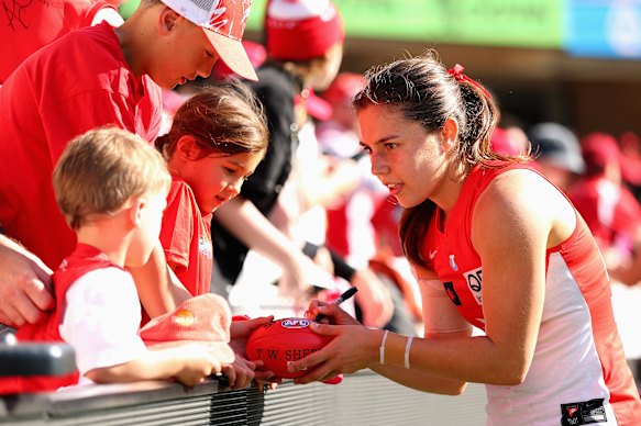 Sofia Hurley greets fans after the Swans win over Essendon.