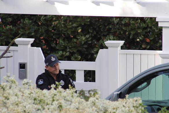 Police at the Clayfield home on Saturday.