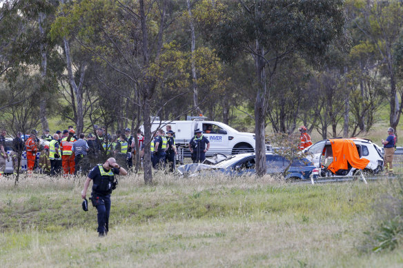 Police and SES emergency workers on the scene of the freeway crash.