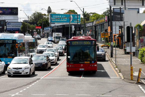 Buses simply take up two lanes instead of just one.