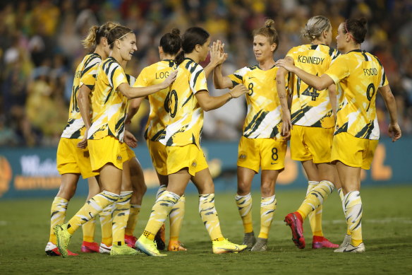 The Matildas celebrate during a Tokyo 2020 Asian qualifier. 