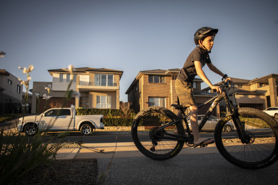 Ryan Andreas, 10, rides his bike in North Kellyville after finishing home schooling.