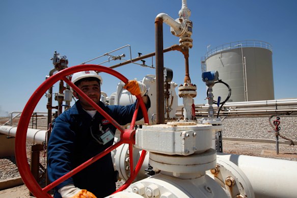 An oil field worker in Iraq.