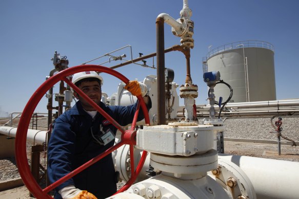An oil field worker in Iraq.