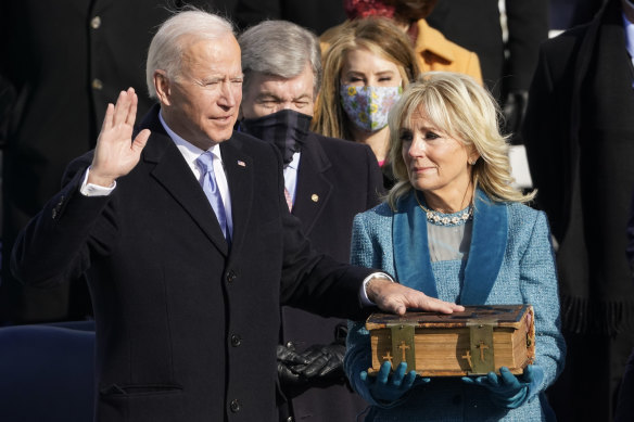 Jill Biden looks on as Joe Biden is sworn in as US president four years ago.