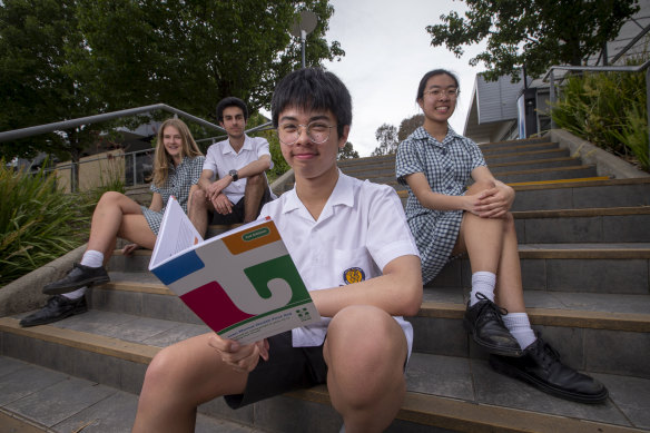 The program helped Francis Manguilin (centre) respond when his friend was acting quiet and distant.