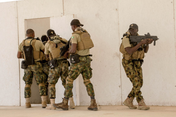 Nigerian Navy Special Boat Service troops exercise last week under the supervision of British special forces during US military-led annual counterterrorism exercise in Thies, Senegal.