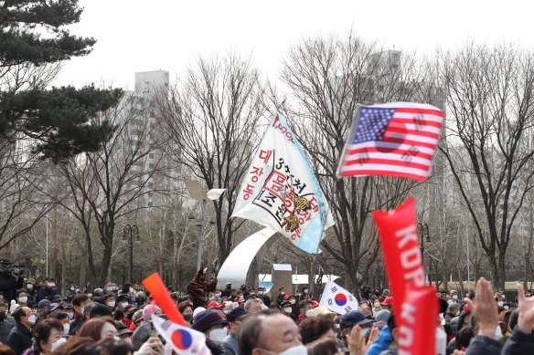 A trump rally feel to the campaigns: Supporters of the main presidential candidates take part in rallies ahead of Wednesday’s election.