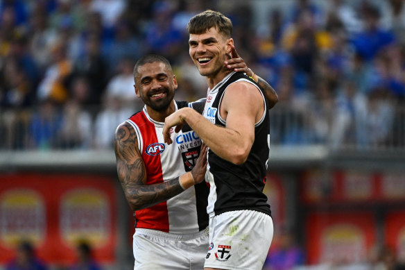 Bradley Hill and Mason Wood of the Saints celebrate a goal.