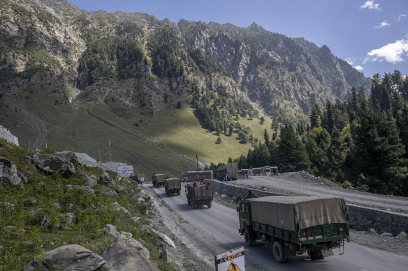 n Indian army convoy moves on the Srinagar- Ladakh highway at Gagangeer, northeast of Srinagar, Indian-controlled Kashmir. India has border disputes with China and Pakistan over sections of Kashmir.