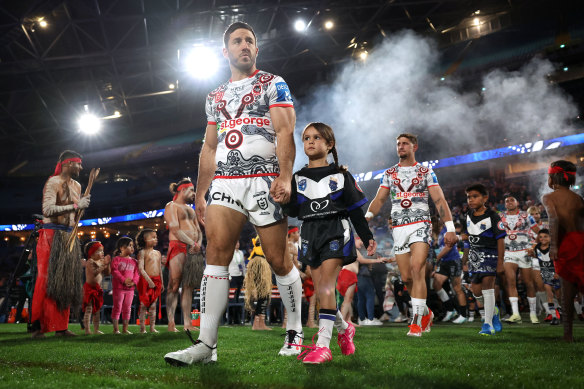 Ben Hunt leads the Dragons out against the Bulldogs for their Indigenous Round clash.