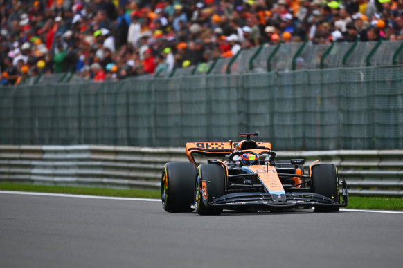 Oscar Piastri driving the (81) McLaren MCL60 Mercedes on track before retiring from the race.